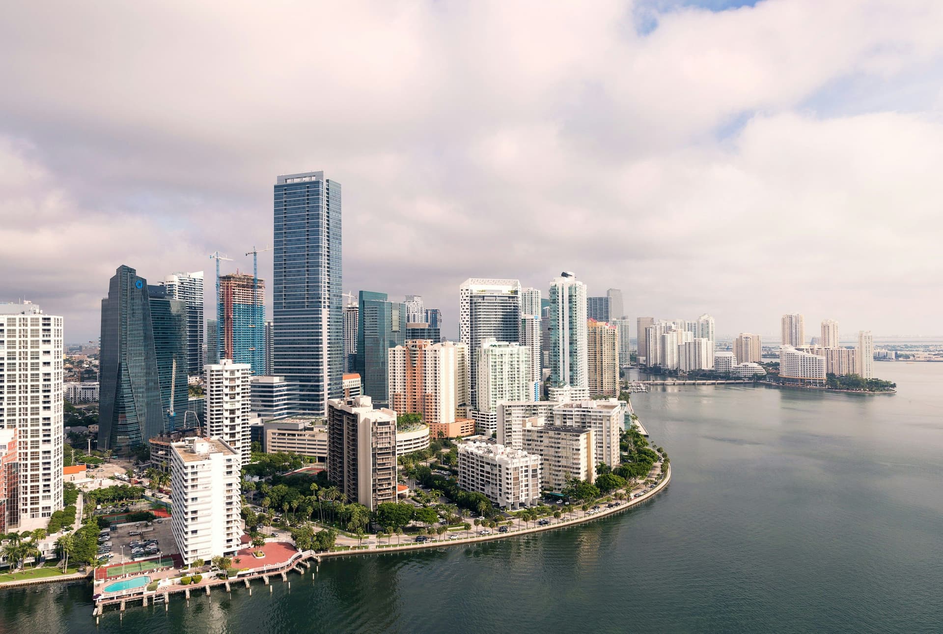 Brickell vs Miami Beach Condos: Pricing & Lifestyle Comparison